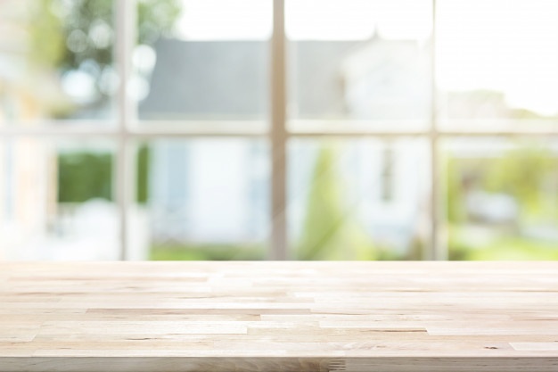 Woven Wood Shades vs. Roman Shades